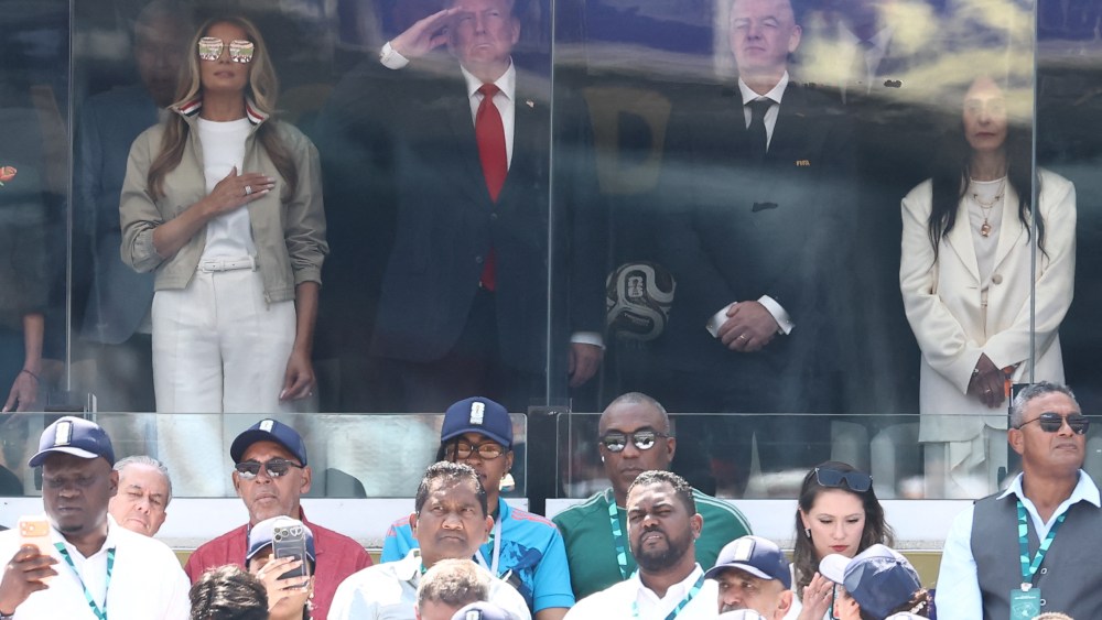 (From L) US First Lady Melania Trump, US President Donald Trump and FIFA President Gianni Infantino and his wife Leena Al Ashqar stand for the national anthem ahead of the 2026 World Cup football final between Spain and Argentina in East Rutherford, New Jersey on July 19, 2026.  (Photo by CHARLY TRIBALLEAU / AFP via Getty Images)