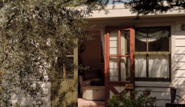 A designer’s artfully layered London home with the most charming garden studio