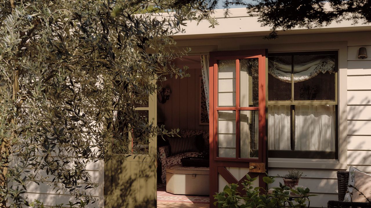 A designer’s artfully layered London home with the most charming garden studio