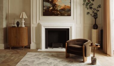 neutral living room with fireplace and brown armchair