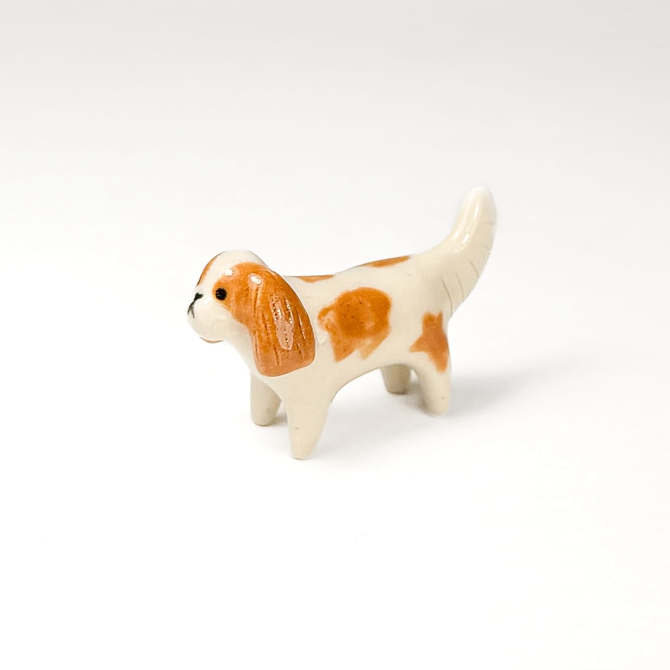 a tiny ceramic dog