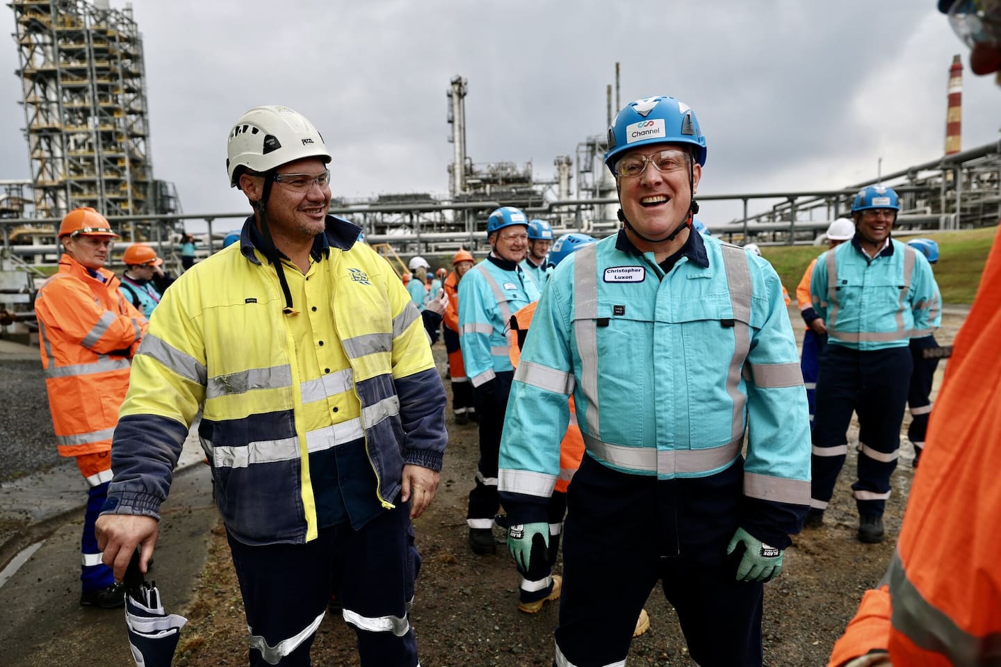 PM Christopher Luxon (right) meets with some of the Channel Infrastructure team behind the refurbishment of the storage tanks. Photo / Dean Purcell