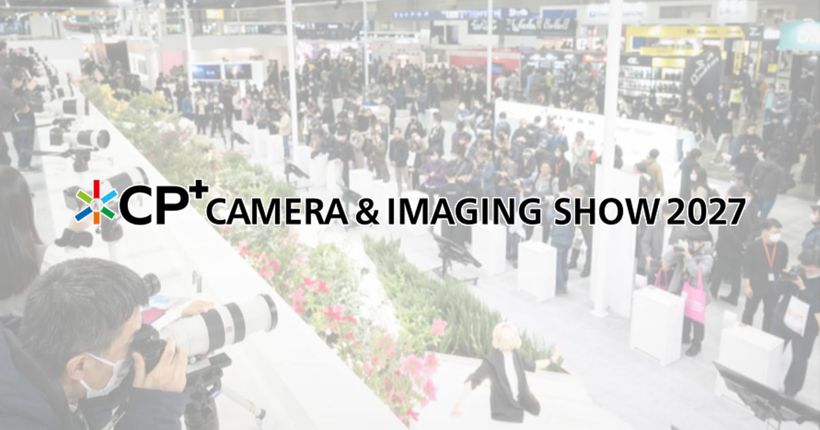 Crowds walk through a busy camera expo with photographers using large lenses. Text reads: "CP+ Camera & Imaging Show 2027." Bright, modern indoor setting.