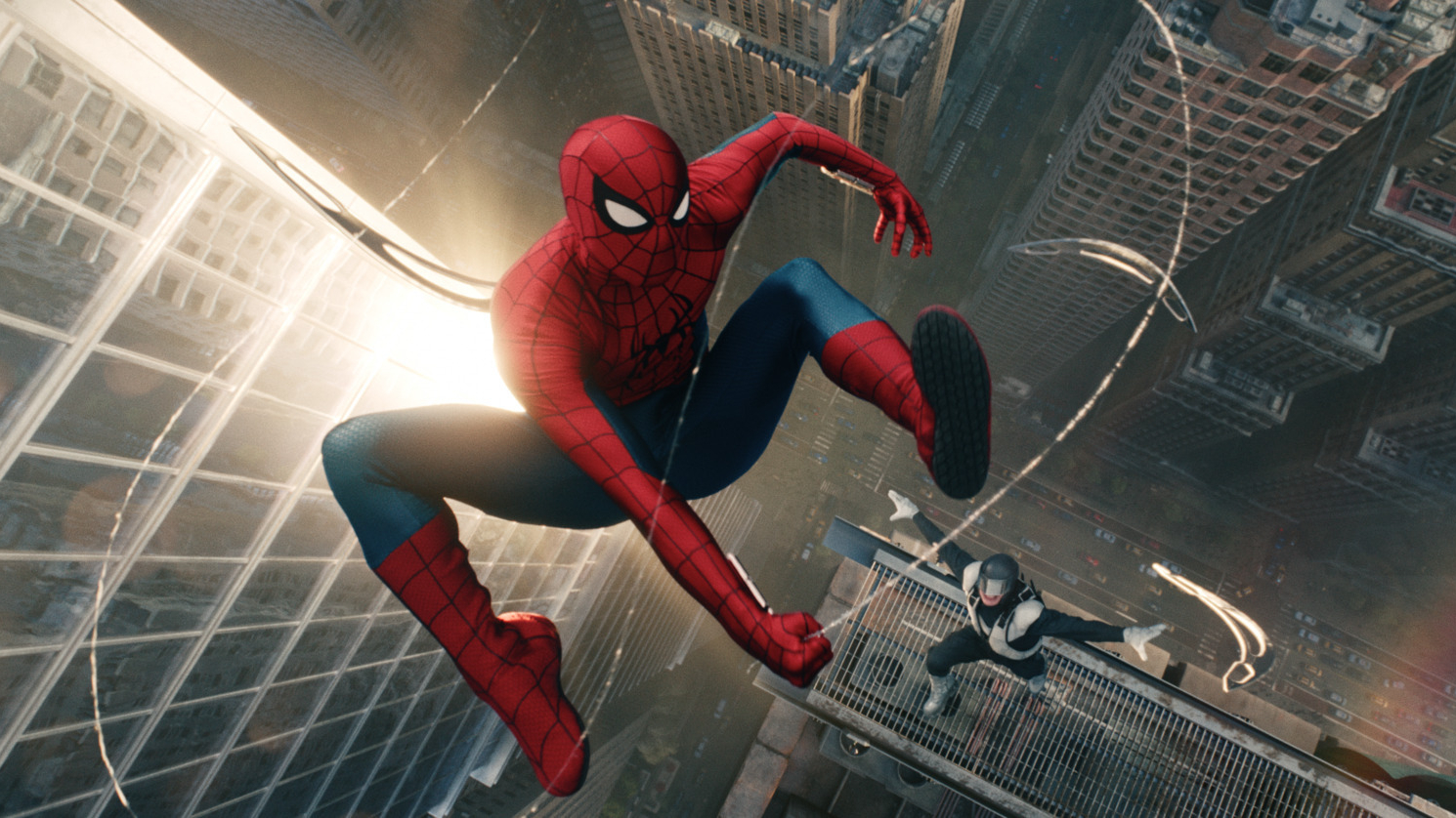 Spider-Man (Tom Holland) swinging through the sky in a still from "Spider-Man: Brand New Day"