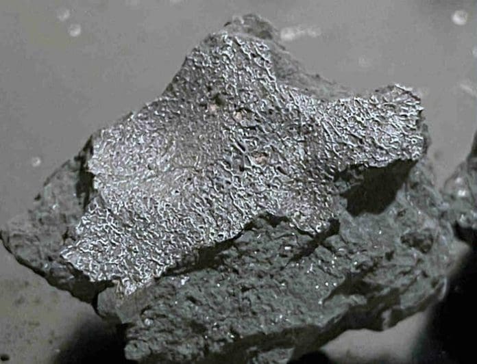 Fragment of the Hillsborough meteorite, broken on impact, with fusion crust from passing at high speed through the Earth’s atmosphere. Credit SETI Institute