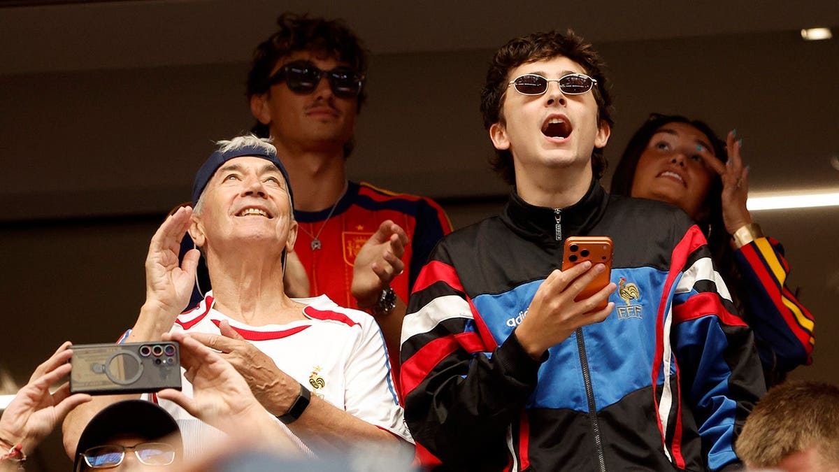 Timothee Chalamet and Marc Chalamet attend a soccer match in Arlington, Texas.