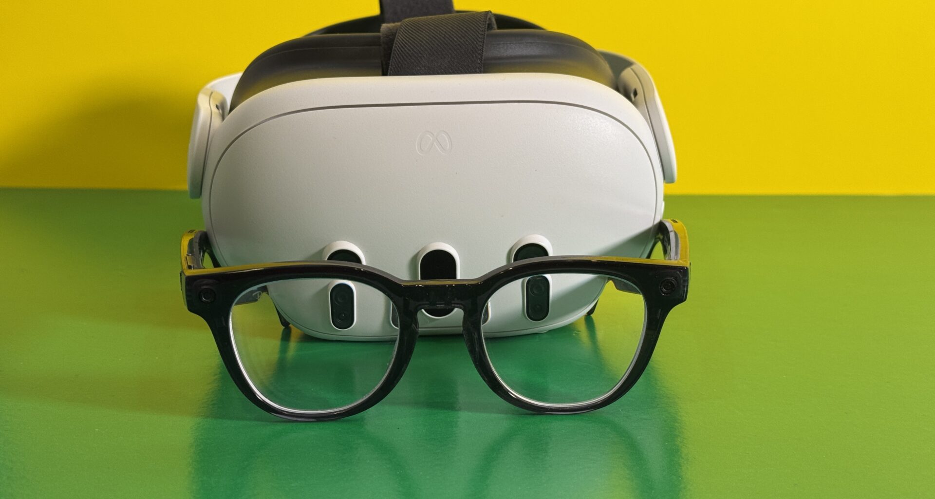 Meta Quest 3 VR headset and Meta Ray-Ban Scriber Optics smart glasses, one in front of the other