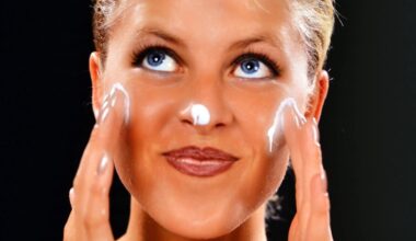 A woman moisturizing her face