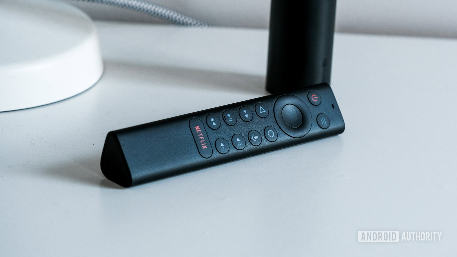 NVIDA Shield TV 2019 remote control on table NVIDA Shield TV 2019 remote control on table