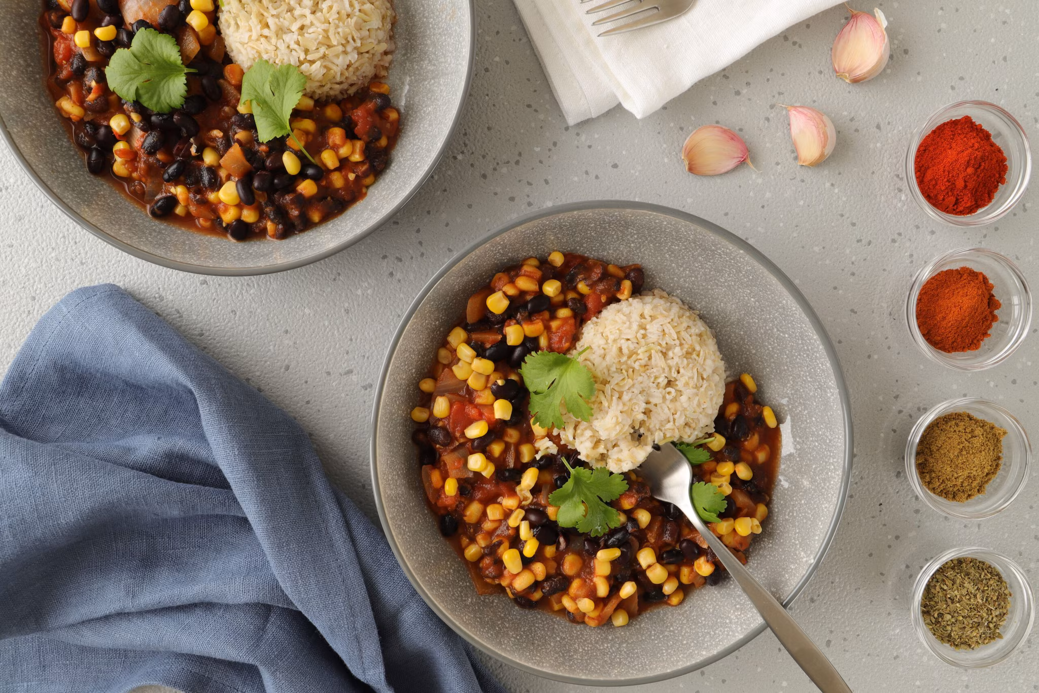 Black Bean And Corn Mexican Bowl: Bring bright flavours to a gray monsoon day with black beans, sweet corn, and shredded grilled chicken or paneer. Layered over brown rice, it’s finished with a generous dollop of fresh, immunity-boosting tomato salsa and creamy guacamole. (Representative Image: Pexels)