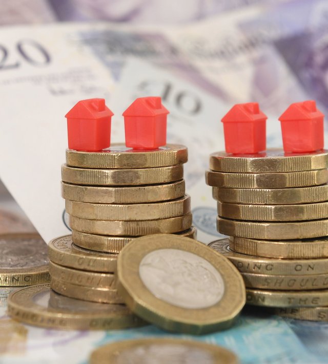 File photo dated 12/09/18 of model houses on a pile of coins and bank notes. Plans to create a fairer private rented sector in England are taking a step forward with the publication of a Government White Paper on Thursday. Issue date: Thursday June 16, 2022. PA Photo. Tenants will have stronger powers to challenge poor practice and unjustified rent increases under the proposals, and they could also be saved the expense of having to move as often from one rented home to another. See PA story MONEY Renters. Photo credit should read: Joe Giddens/PA Wire