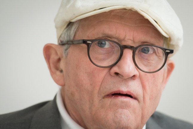 (FILES) Artist David Hockney poses for photographs during a press preview of his new exhibition entitled "Painting and Photography" in central London, on May 14, 2015. British artist David Hockney has died aged 88, it was announced on June 12, 2026. British artist David Hockney's paintings captured the world in brilliant colour, from carefree 1960s California to the bucolic landscapes of his native Yorkshire. (Photo by LEON NEAL / AFP via Getty Images)