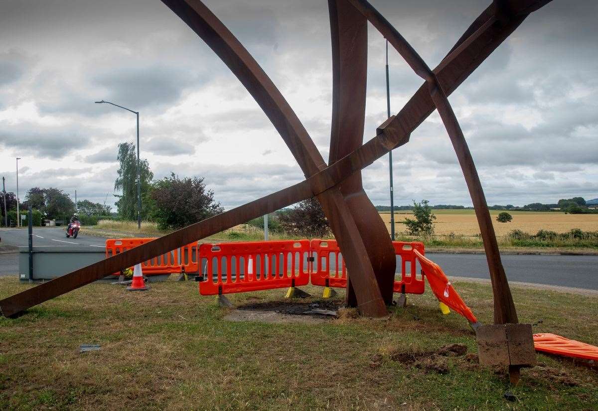 Vehicle damages the universe - Stratford sculpture needs repair job