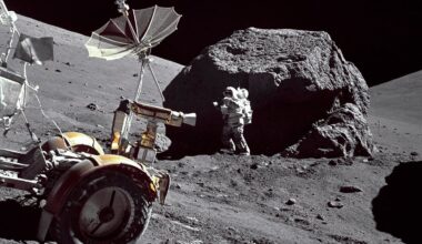Geologist-Astronaut Harrison H. Schmitt is photographed standing next to a huge, split boulder at Station 6 on the sloping base of North Massif during the third Apollo 17 extravehicular activity (EVA-3) at the Taurus-Littrow landing site. Credit: NASA