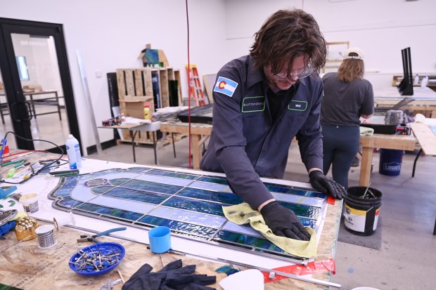 Will Jefferies assembles a piece of stained glass at Scottish Stained Glass in Centennial on Tuesday, May 19, 2026. (Photo by Hyoung Chang/The Denver Post)