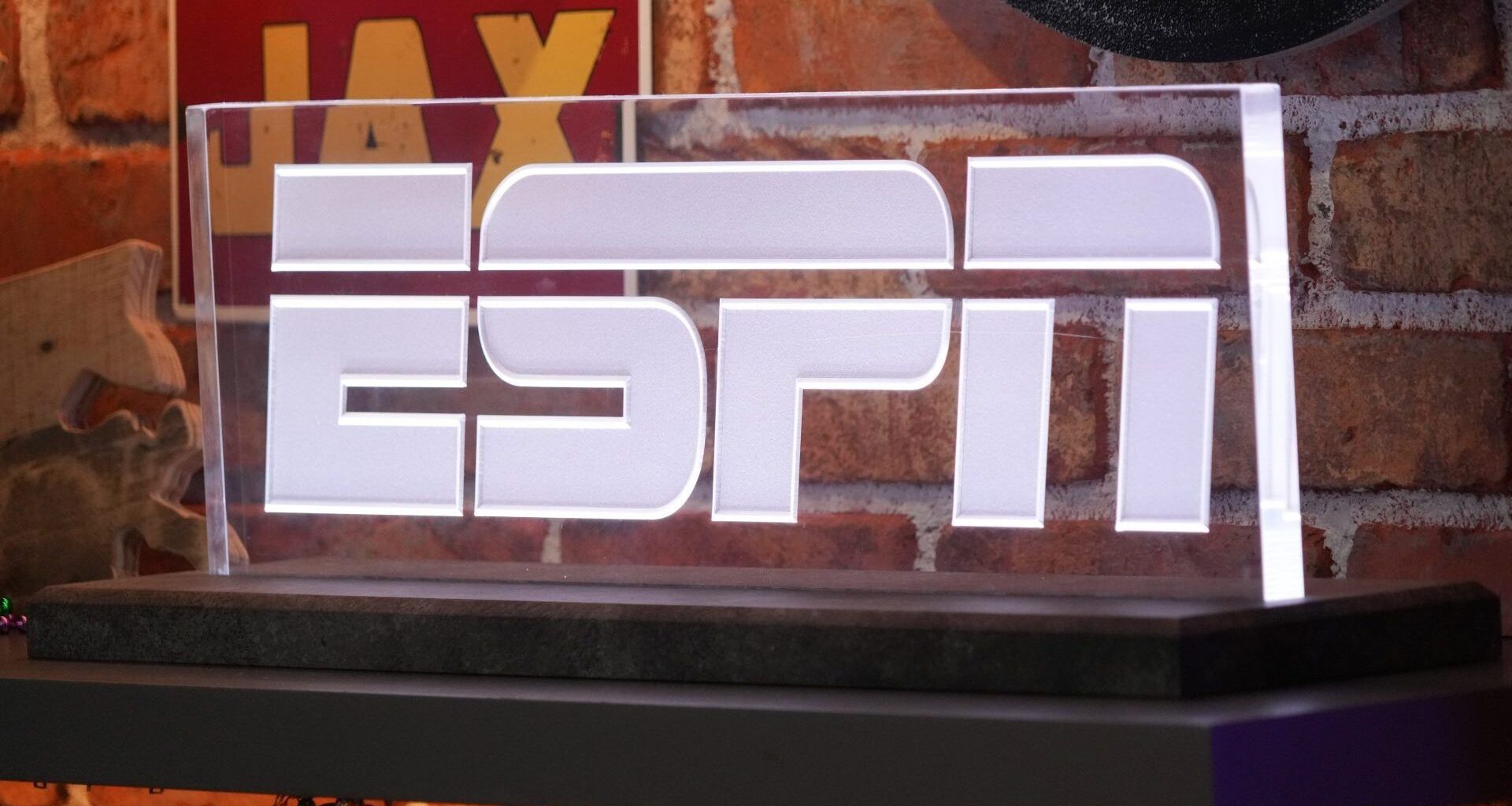 Feb 5, 2025; New Orleans, LA, USA; The ESPN logo at the Super Bowl LIX media center at the Ernest N. Morial Convention Center. Mandatory Credit: Kirby Lee-Imagn Images