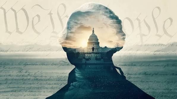 A composite silhouette of a historic figure overlaid with a view of the U.S. Capitol building at sunrise, set against a backdrop of cursive script reading "We the People."
