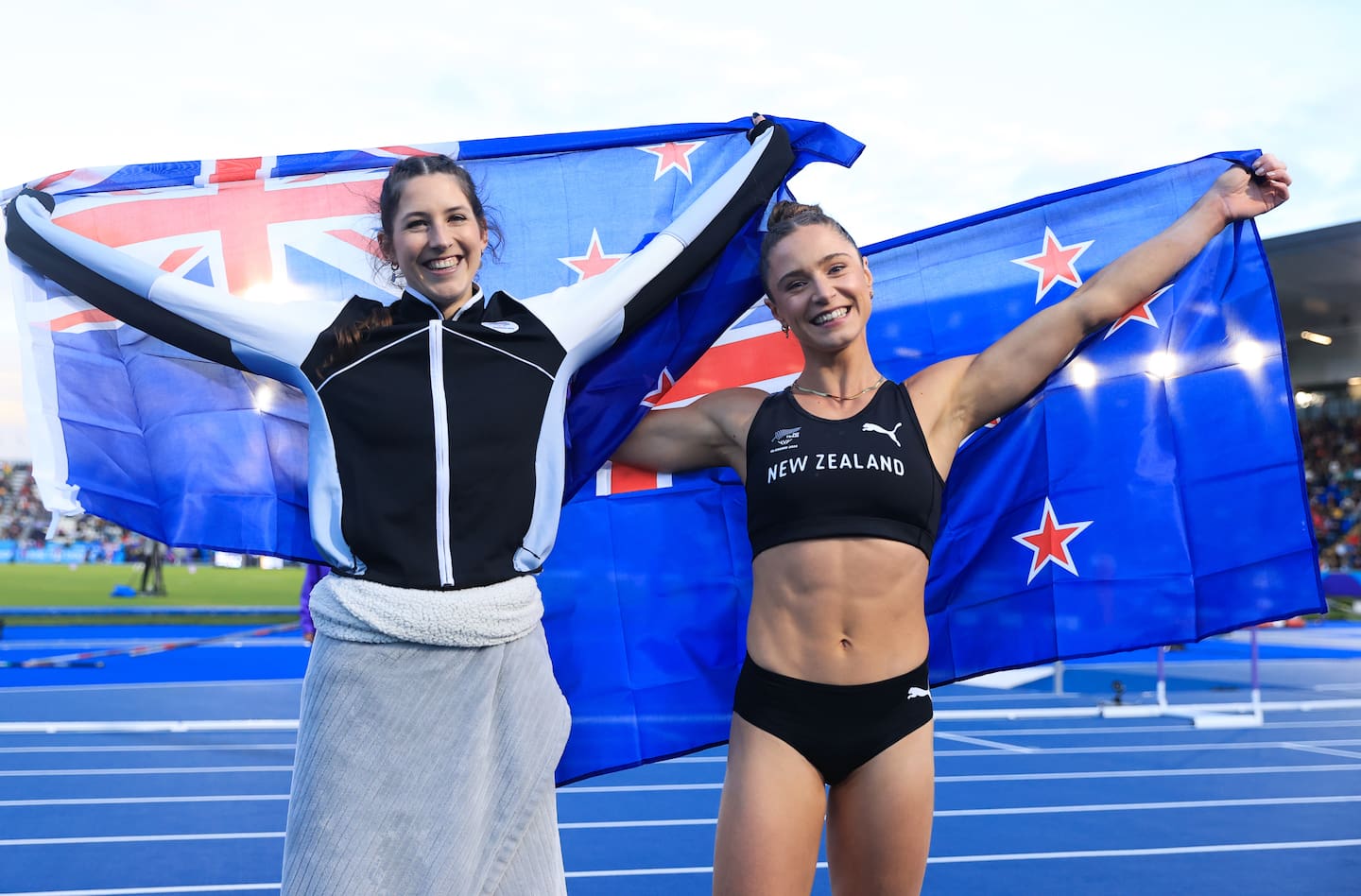 Eliza McCartney and Imogen Ayris celebrate their Commonwealth Games medals. Photo / Photosport
