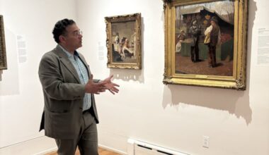 Woodmere director Bill Valerio stands in the Antonelli Gallery at the opening of the Chestnut Hill museum's  'Arc of Promise' exhibition featuring the work of Philadelphia artists who painted Black people with humanity during the Civil War era.