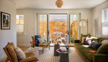A living room with a patio door leading outdoors.
