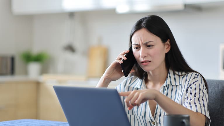 A confused woman speaks on the phone. (File image).