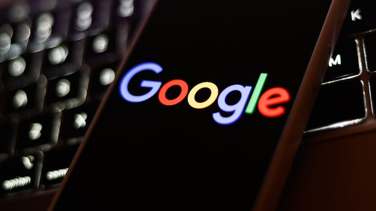 A Google logo displayed on a mobile phone. File photo.