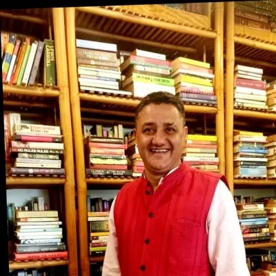 A guest at Mauji's library