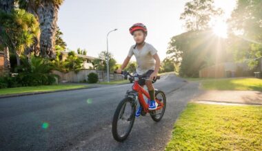 Kids to be able to ride bikes on footpath with adult alongside
