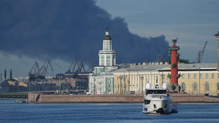 A plumes of black smoke is seen over the port of St. Petersburg, Russia, Wednesday, June 3, 2026, after a Ukrainian drone attack.