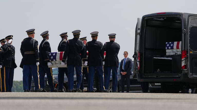 A US Army carry team moves a transfer case containing the remains of Pvt. Isabella Gonzales of Carrollton, Texas`.
