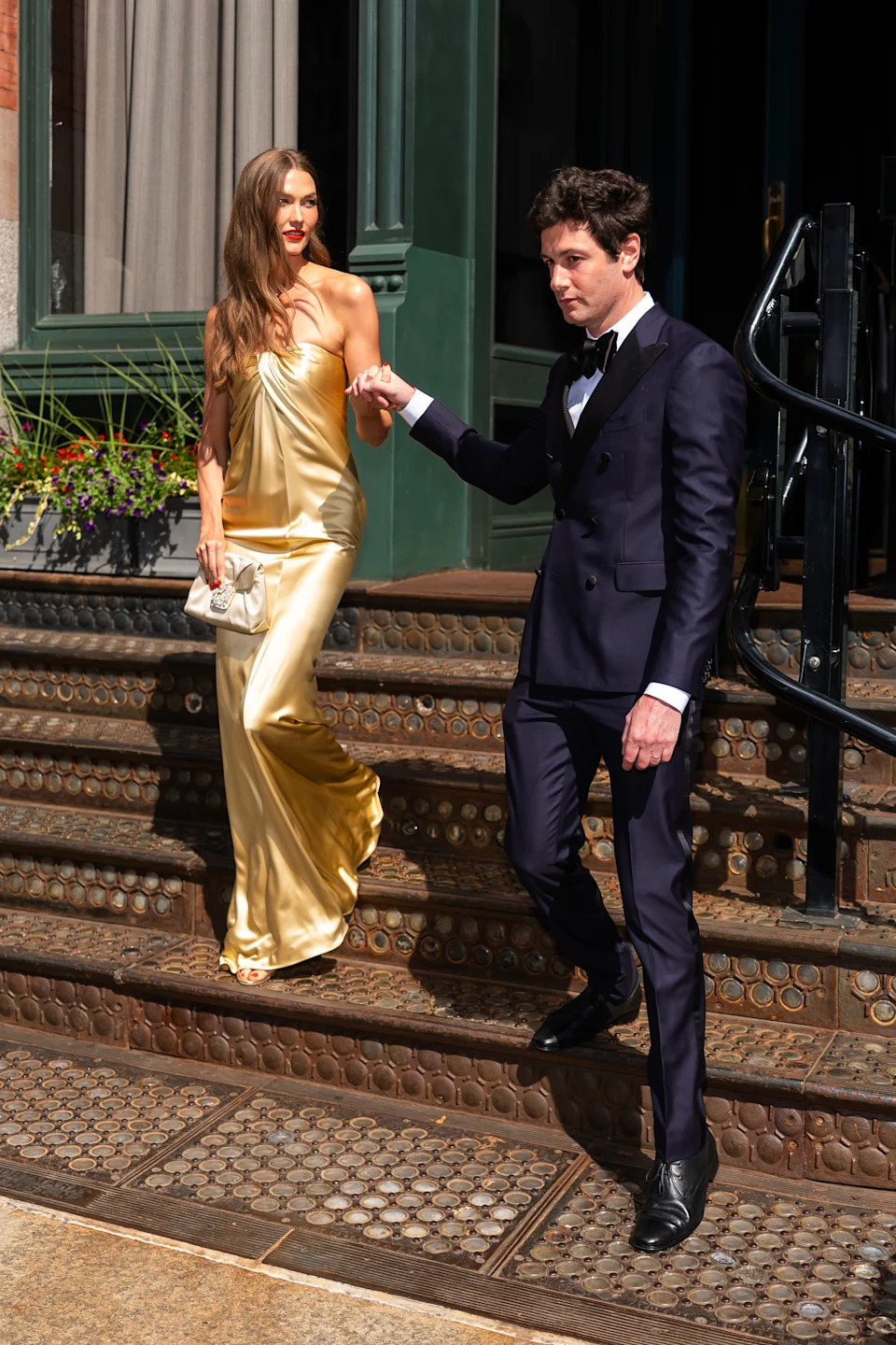 Karlie Kloss and her husband, Josh Kushner (seen together above), were photographed making their way to Taylor Swift and Travis Kelce’s wedding at Madison Square Garden on Friday. GC Images