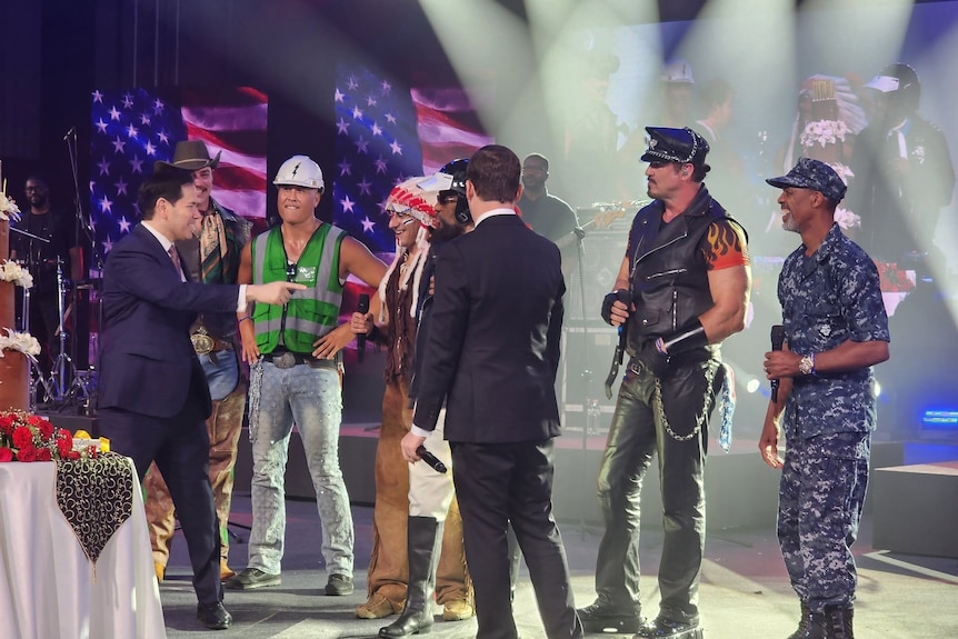 The Village People on stage with Secretary of State Marco Rubio.