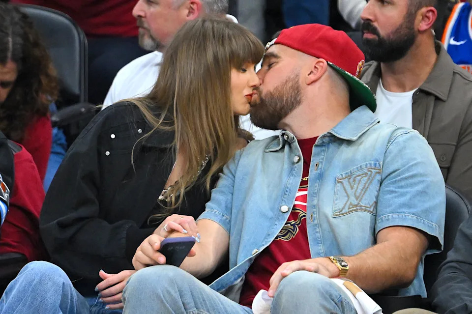 While keeping details of their romance under wraps, the two (pictured here in May) continued to pack on the PDA around town. Getty Images