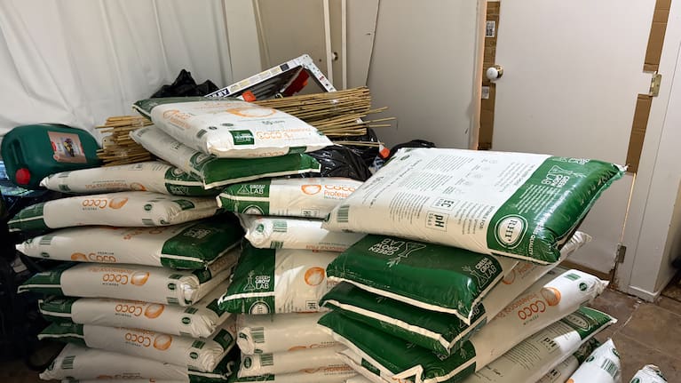 Alongside cannabis, tens of thousands of dollars of cash were seized, along with cannabis growing equipment.