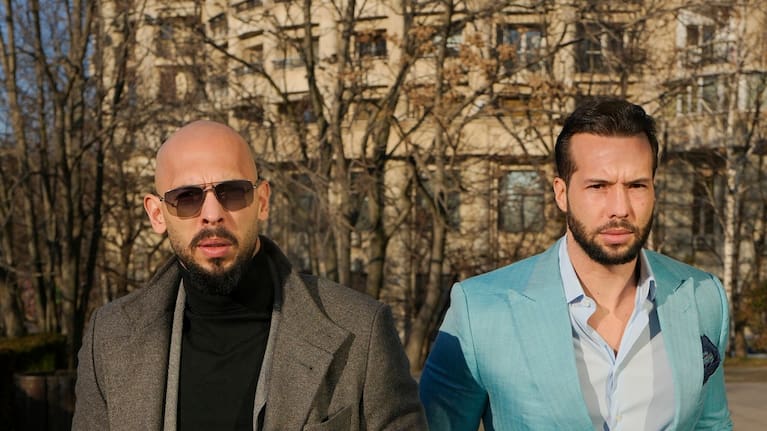 Andrew Tate, left, and his brother Tristan arrive at the Bucharest Tribunal in Bucharest, Romania on February 1, 2024.