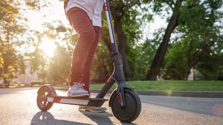 A person in a park riding their e-scooter (file image). 
