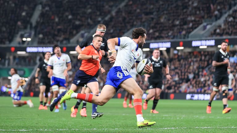 Antoine Hastoy runs in for a try for France against the All Blacks.