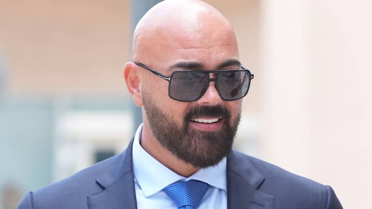 Attorney Joseph McBride arrives for a court hearing for his clients Andrew and Tristan Tate after they were arrested to face rape and sex trafficking charges.