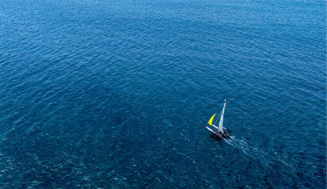 Chris Bertish sailing on a catamaran