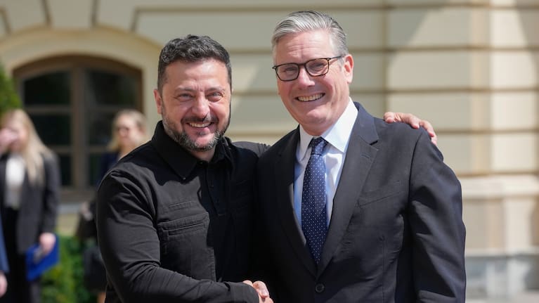 Britain's Prime Minister Keir Starmer, right, and Ukraine's President Volodymyr Zelenskyy greet each other in Kyiv, Ukraine.