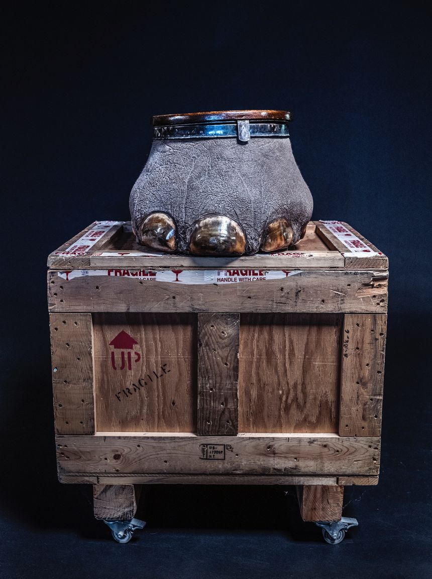 A minibar made from an elephant's foot, photographed by Britta Jaschinski as part of her series documenting the illegal wildlife trade.