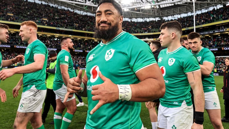 New Zealand-born Ireland centre Bundee Aki celebrates after his team's win over Wales.