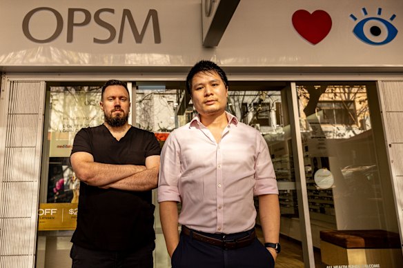 Optometrists Matt Trinh (right) and Rory Dowdall say corporate chains like OPSM are putting profits over patient care.