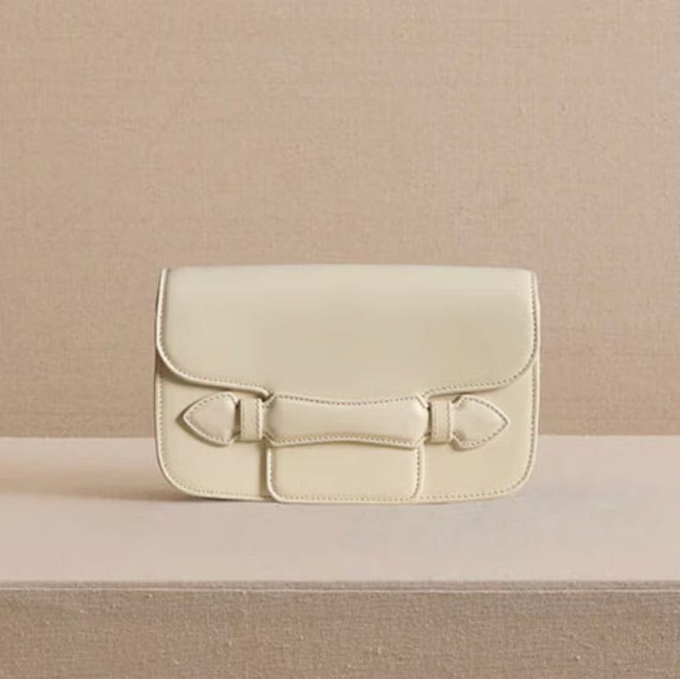 Romy Clutch in Ivory