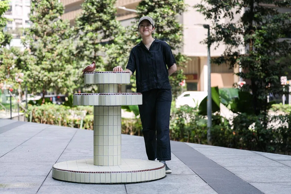 Artist Catherine Hu with her artwork, A fountain when it rains, at One Raffles Quay on July 1, 2026. The artwork is part of the Singapore Art Museum's first public art trail in Singapore's Central Business District. ST PHOTO: BRIAN TEO