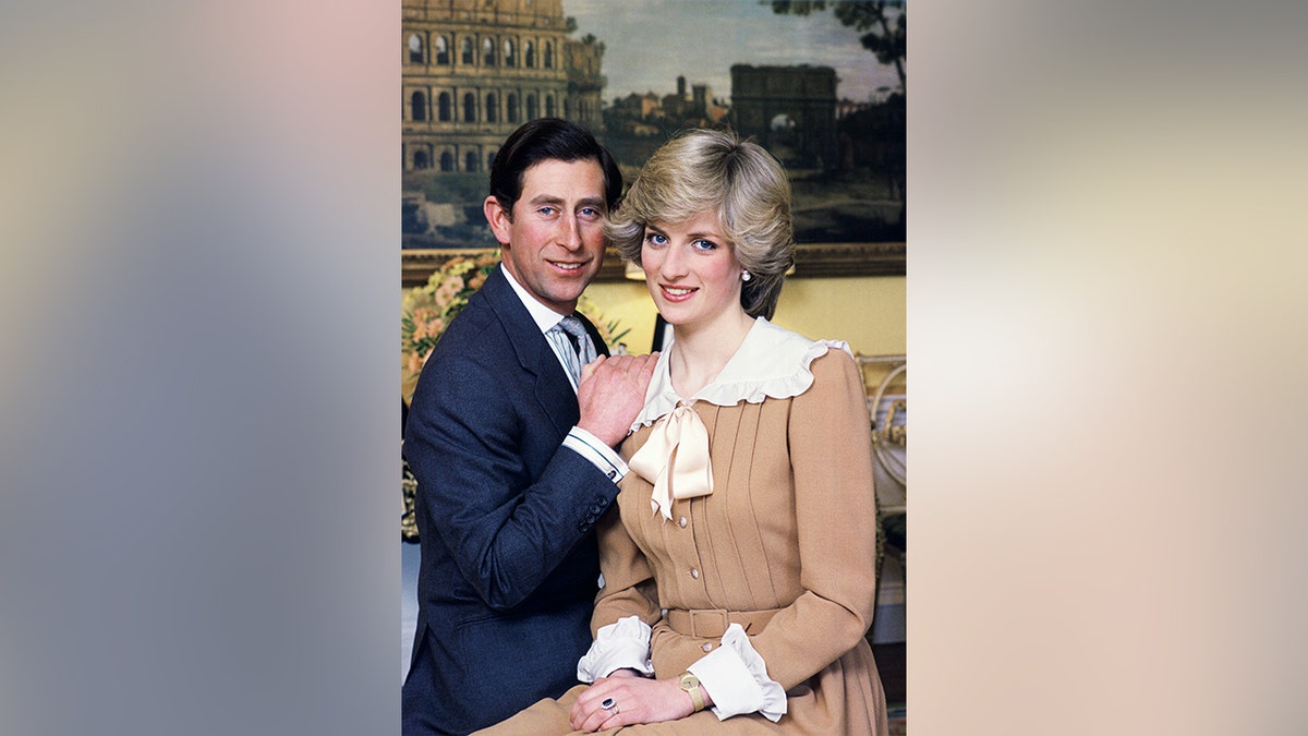 Portrait of Charles and Diana seated in their home in Kensington Palace.