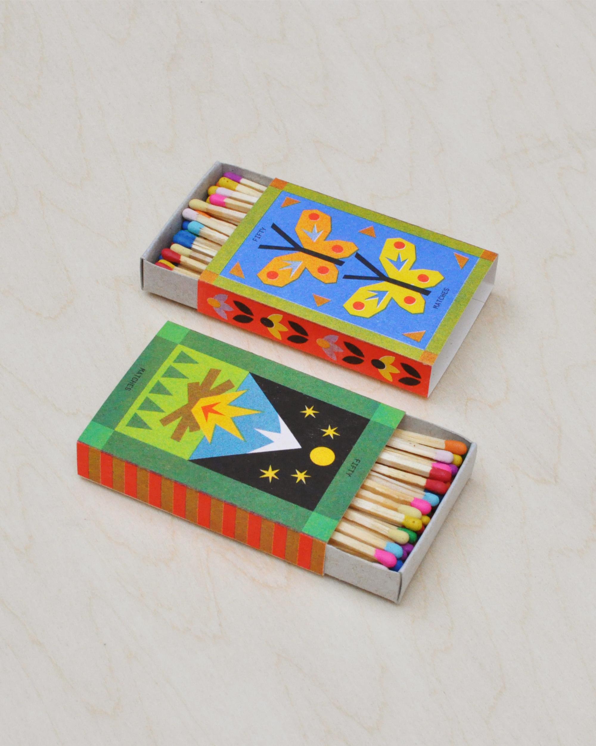 two colorful risograph matchboxes