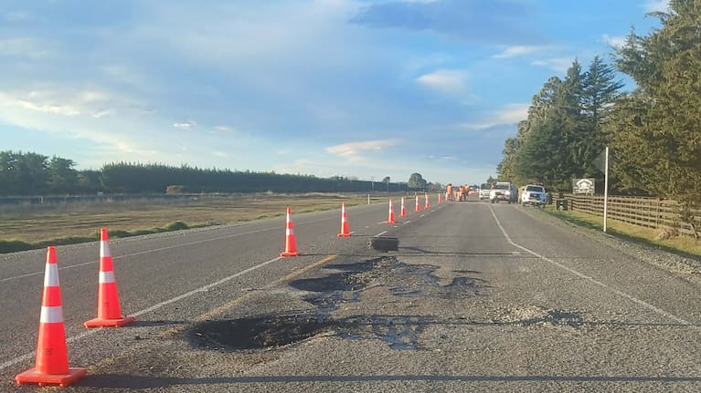 Contractors were on site on Tuesday, filling in over 100 potholes in the 1km section of State Highway 1 south of Ashburton. (Source: Ashburton Guardian / Amy Riach)