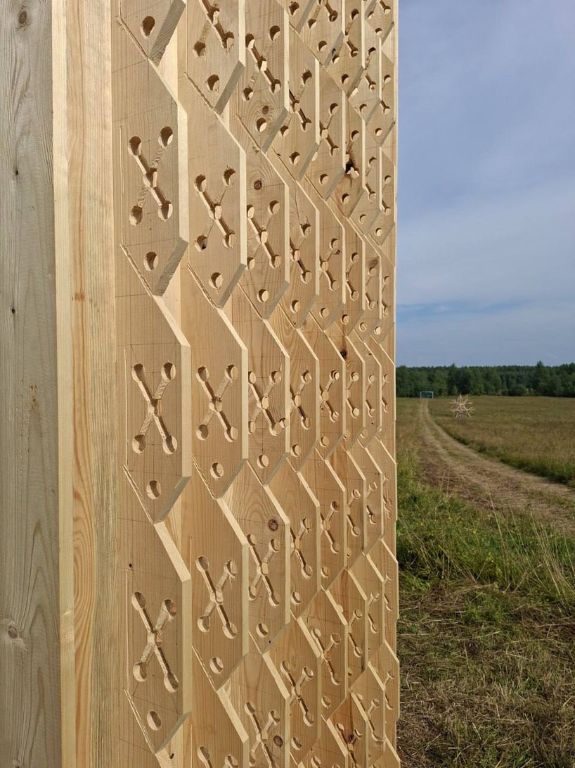 as contemporary propylaea, twin timber gateways frame open-air architectural park in russia - 2