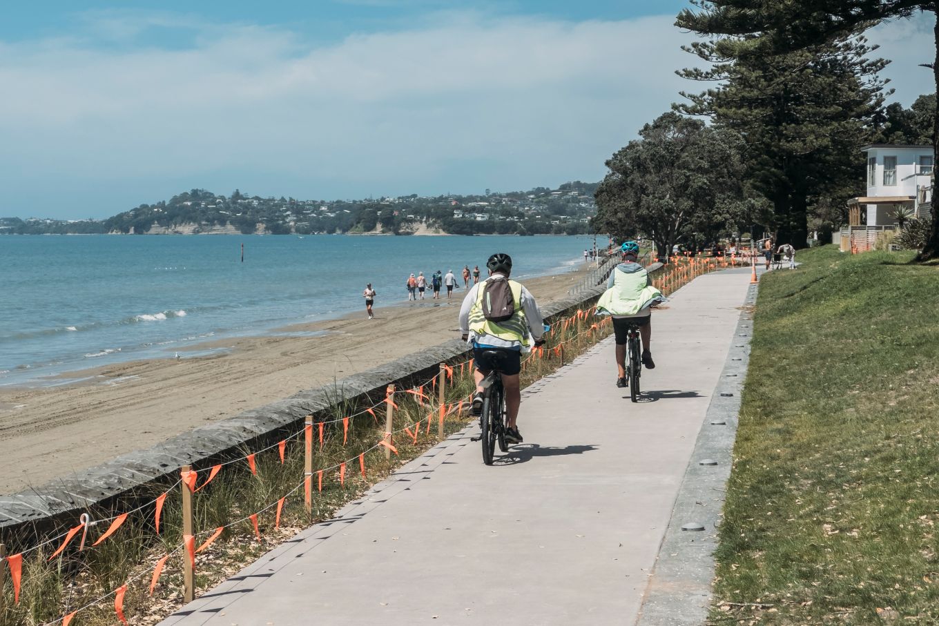 Cyclists enjoy the shared pathway.